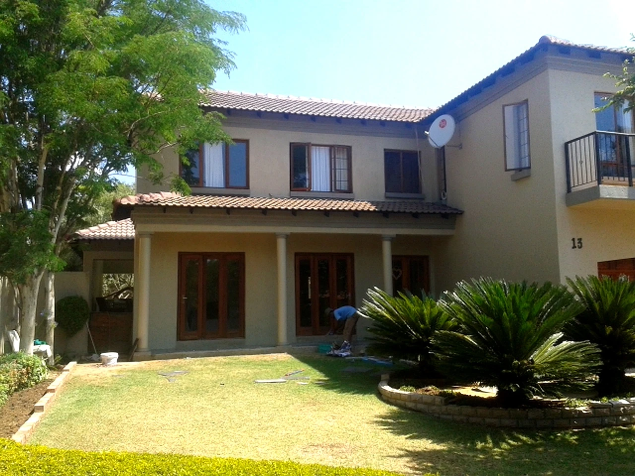 Double storey home with front garden landscaping