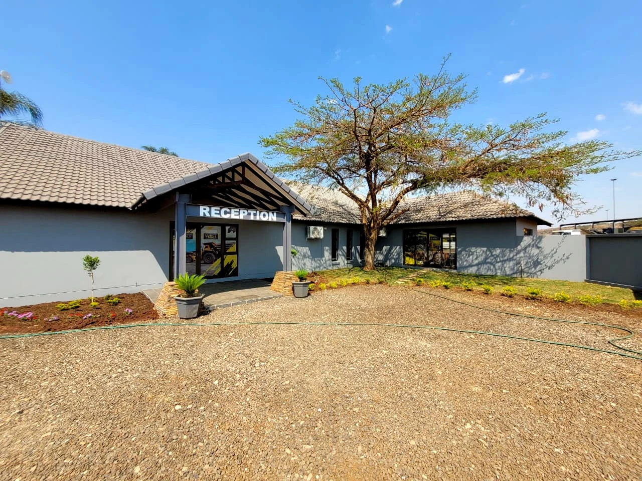 Farmhouse style home courtyard exterior with completed finishes