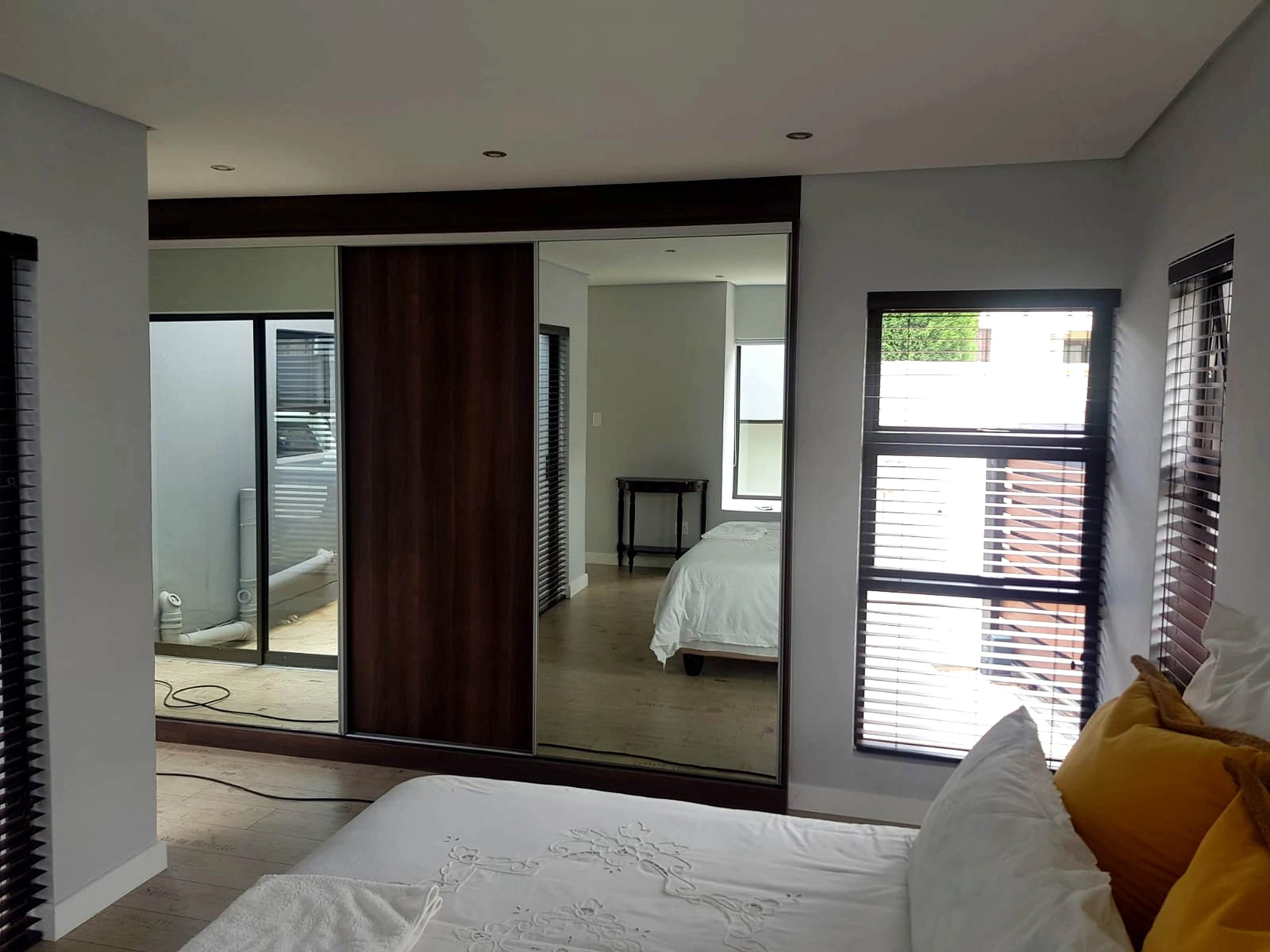 Modern bedroom with built in wardrobes and fitted storage