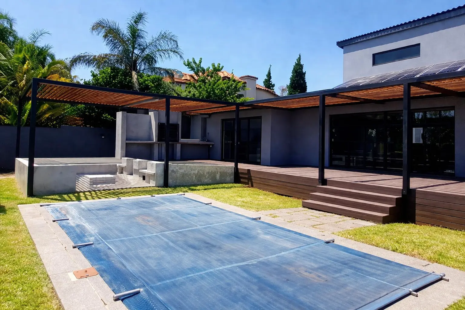 Modern home patio and driveway exterior with paving