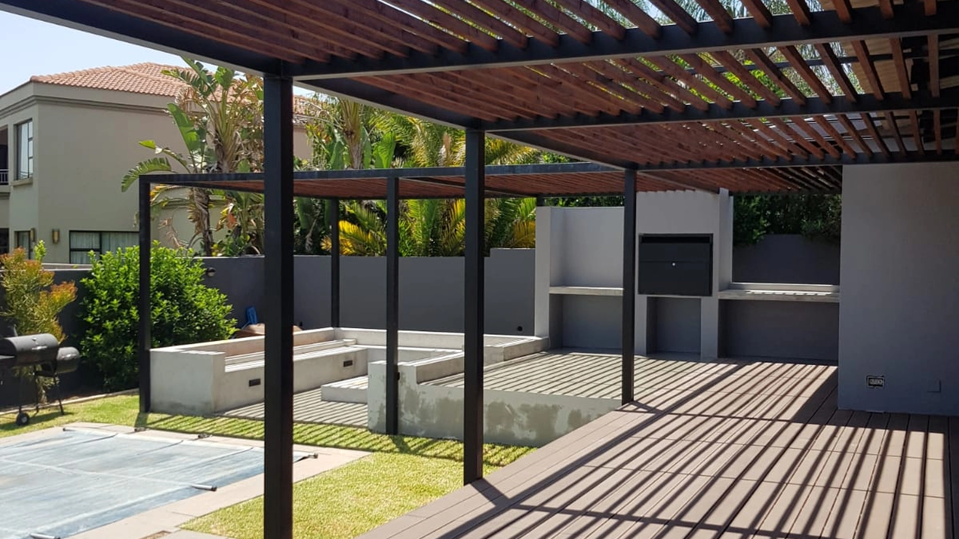 Modern pergola and outdoor patio installation
